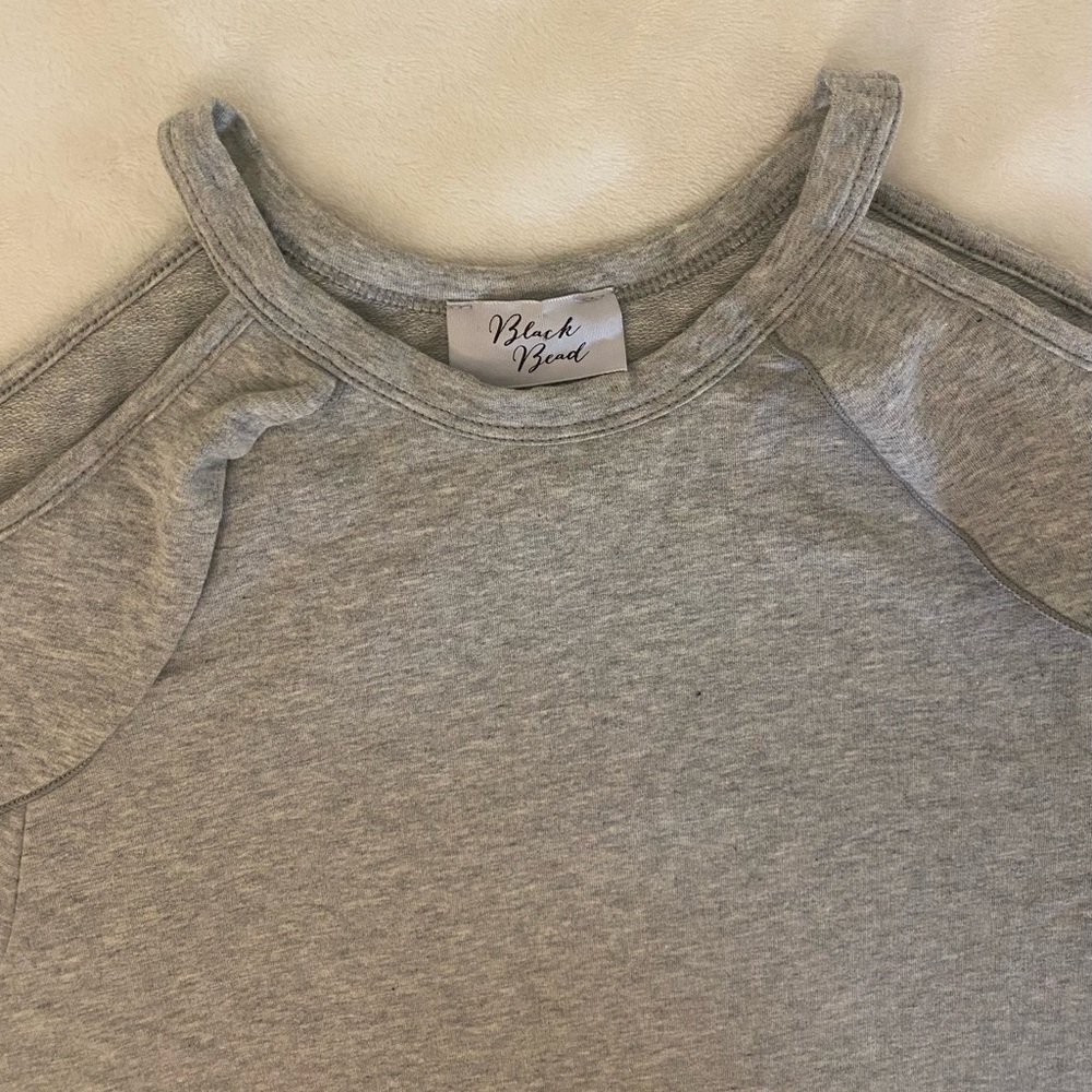 Cut Out Shoulder Top with Ruffle Detailing - Picture 4 of 6